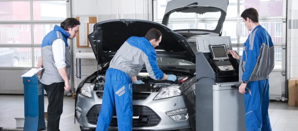Car Service blog featured image showing mechanics