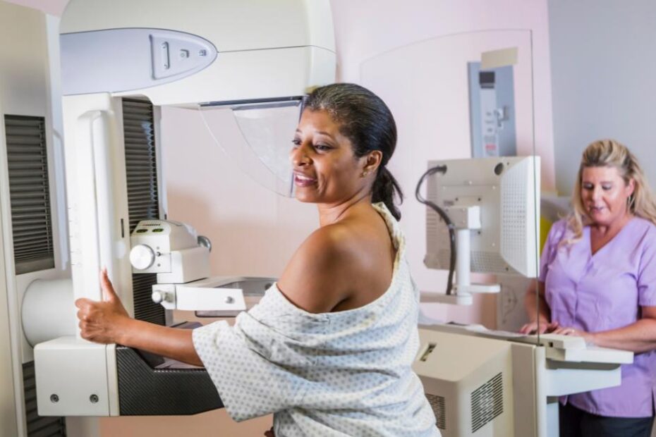 Mammograms blog featured image showing a woman having a mammogram