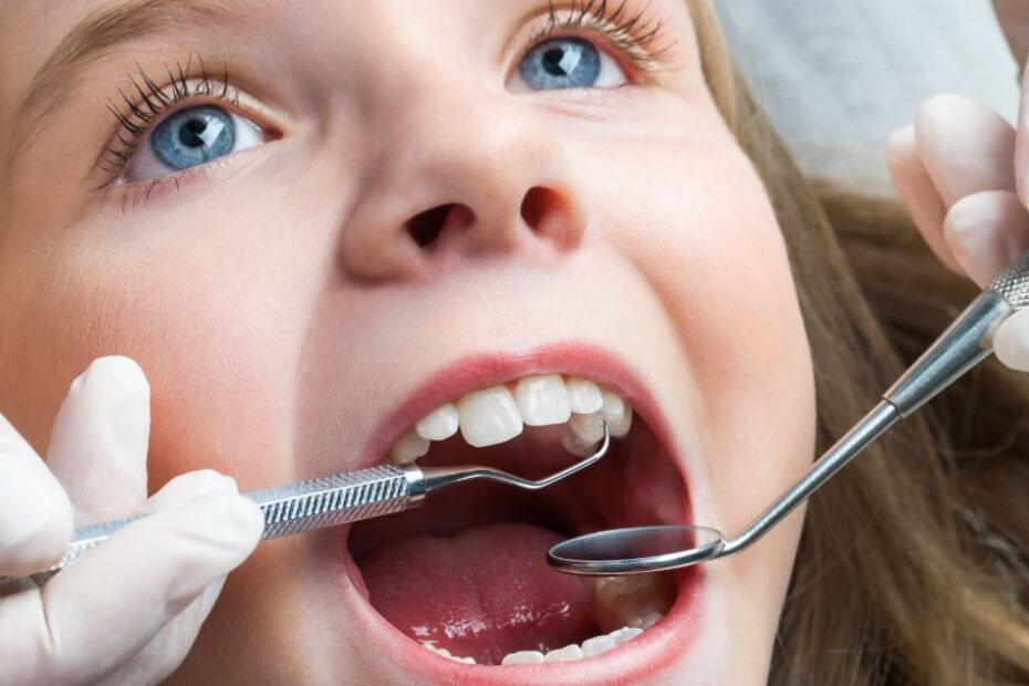 Little girl having a dental check up