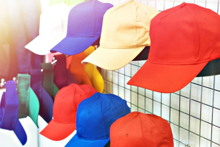 Colored baseball caps on store display