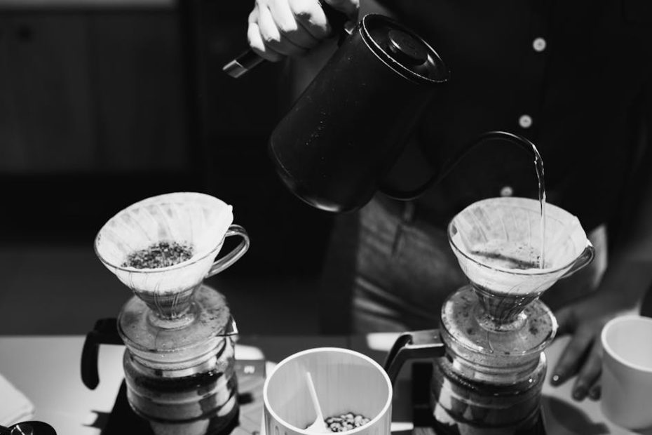 A barista artistically pouring coffee in a café setting, highlighting the brewing process.