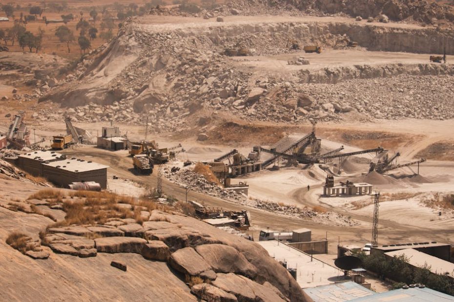 Aerial shot of a large quarry in Kaduna, Nigeria, during the day.