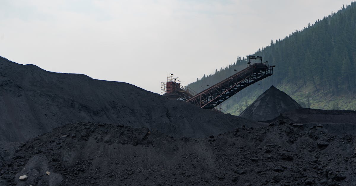 Industrial coal processing facility in Elkford, Canada with large coal piles.
