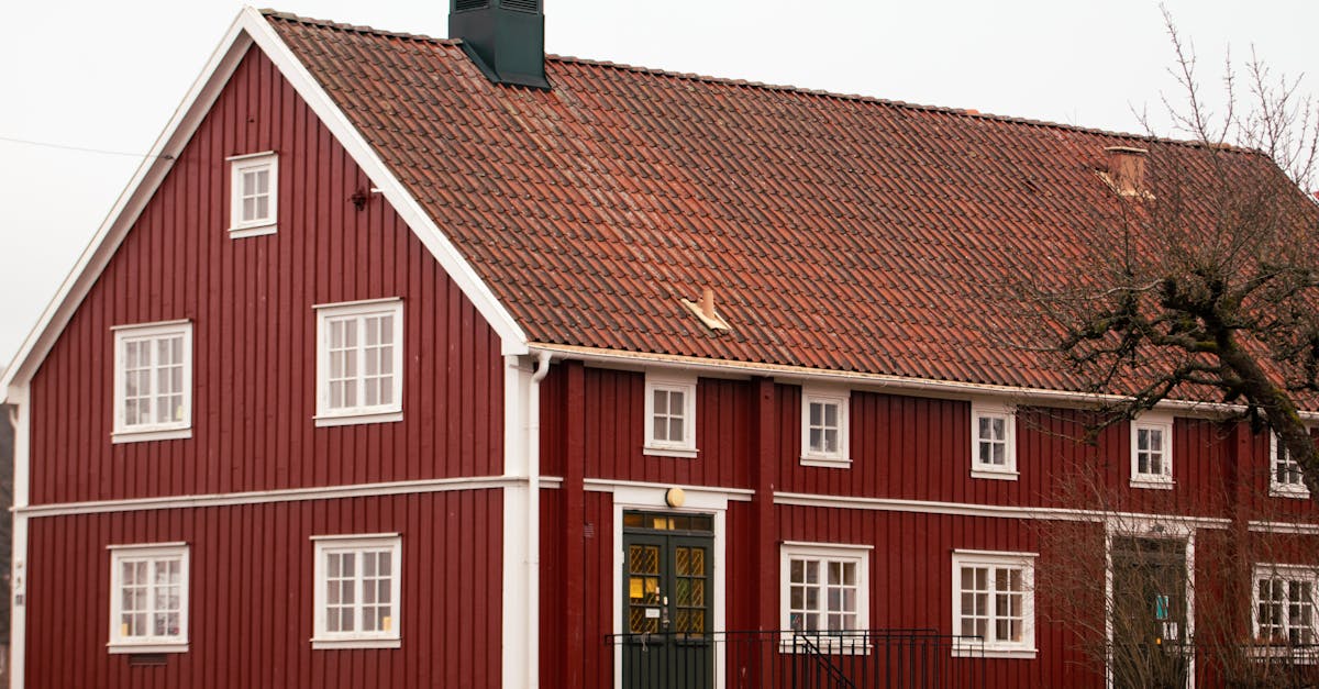 Charming red wooden house with classic Swedish architecture in Jönköping, Sweden.